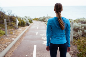 woman contemplating getting enough exercise